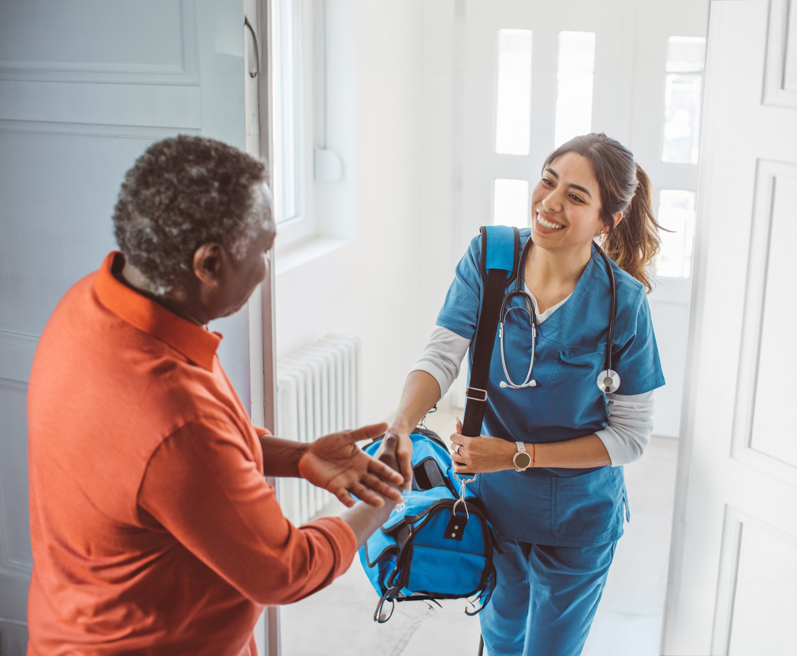 Nurse-Home-Health-Senior-iStock-1399636016-XXL-edit-extended Nurse arriving for an in-home visit with a senior patient